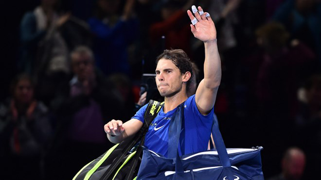 Spain's Rafael Nadal waves to the crowd after losing his singles match against Belgium's David Goffin on day two of the ATP World Tour Finals tennis tournament at the O2 Arena in London on November 13, 2017. Glyn KIRK / AFP