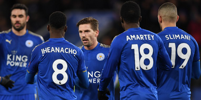Leicester City's Nigerian striker Kelechi Iheanacho celebrates scoring the team's first goal, with teammates during the English FA Cup third round replay football match between Leicester City and Fleetwood Town at King Power Stadium in Leicester, central England on January 16, 2018. Paul ELLIS / AFP