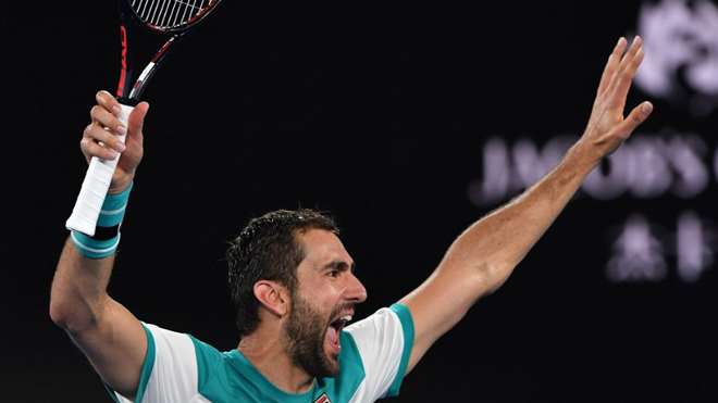 Croatia's Marin Cilic celebrates beating Britain's Kyle Edmund in their men's singles semi-finals match on day 11 of the Australian Open tennis tournament in Melbourne on January 25, 2018. Paul Crock / AFP