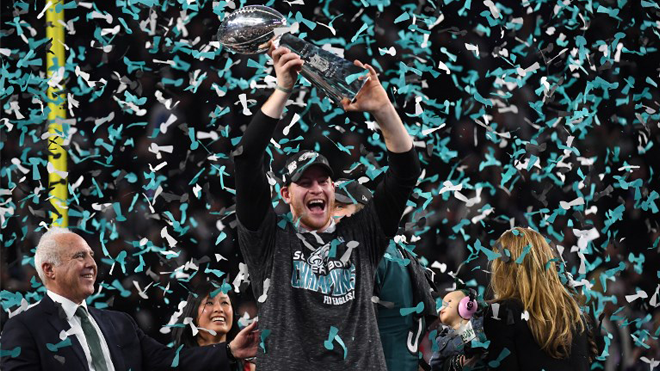 Philadelphia Eagles quarterback Carson Wentz celebrates after winning Super Bowl LII against the New England Patriots at US Bank Stadium in Minneapolis, Minnesota, on February 4, 2018. The Eagles won 41-33 TIMOTHY A. CLARY / AFP