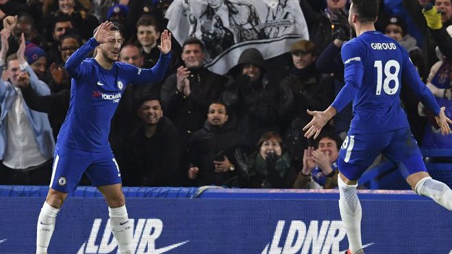 Chelsea's Belgian midfielder Eden Hazard celebrates scoring the opening goal during the English Premier League football match between Chelsea and West Bromwich Albion at Stamford Bridge in London on February 12, 2018. Ben STANSALL / AFP