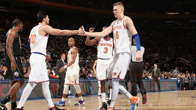 NEW YORK, NY - FEBRUARY 6: The New York Knicks celebrate during the game against the Milwaukee Bucks on February 6, 2018 at Madison Square Garden in New York, NY. NOTE TO USER: User expressly acknowledges and agrees that, by downloading and or using this Photograph, user is consenting to the terms and conditions of the Getty Images License Agreement. Mandatory Copyright Notice: Copyright 2018 NBAE Ned Dishman/NBAE via Getty Images/AFP Ned Dishman / NBAE / Getty Images / AFP