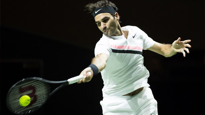 Switzerland's Roger Federer plays a forehand return during his men's singles match against Ruben Bemelmans from Belgium in the first round of the ABN AMRO World Tennis Tournament in Rotterdam on February 14, 2018. Koen Suyk / ANP / AFP