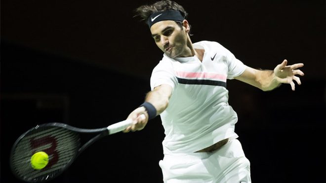 Switzerland's Roger Federer plays a forehand return during his men's singles match against Ruben Bemelmans from Belgium in the first round of the ABN AMRO World Tennis Tournament in Rotterdam on February 14, 2018. Koen Suyk / ANP / AFP