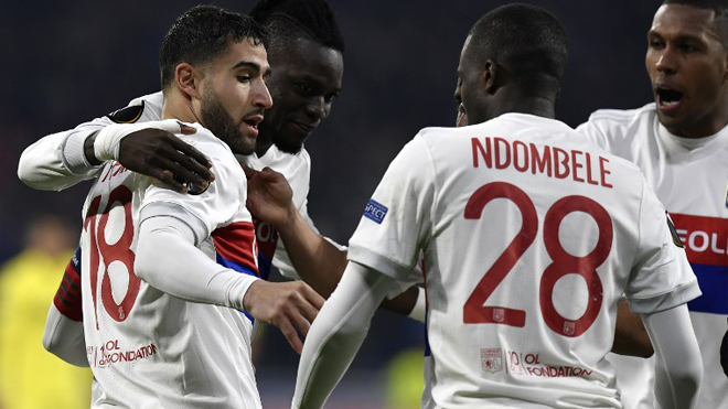 Lyon's French midfielder Nabil Fekir (L) celebrates after scoring a goal during the UEFA Europa League football match between Olympique Lyonnais (OL) and Villarreal CF (VCF) on February 15, 2018, at the Groupama Stadium in Decines-Charpieu, central-eastern France. JEFF PACHOUD / AFP