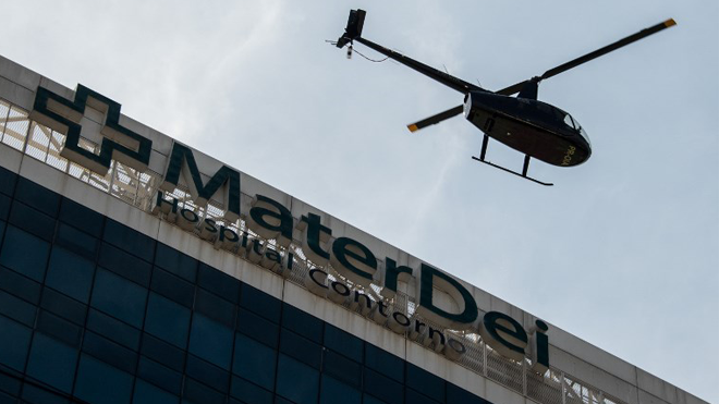 A helicopter leaves Mater Dei hospital carrying onboard Brazil and Paris Saint-Germain superstar Neymar after a successful operation on his broken foot, in Belo Horizonte, state of Minas Gerais, Brazil, on March 4, 2018. It will be six weeks before doctors know when the world's most expensive player can train again. Neymar was discharged early in the morning from the Mater Dei hospital in Belo Horizonte, 24 hours after surgery to repair a fractured fifth metatarsal in his right foot. Nelson ALMEIDA / AFP
