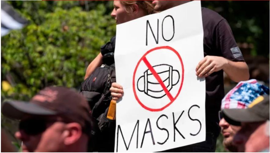 Mascarillas contra el coronavirus en Estados Unidos: por qué hace 100 años muchos se negaron a usar tapabocas contra la gripe española (y qué similitud hay con el covid-19)