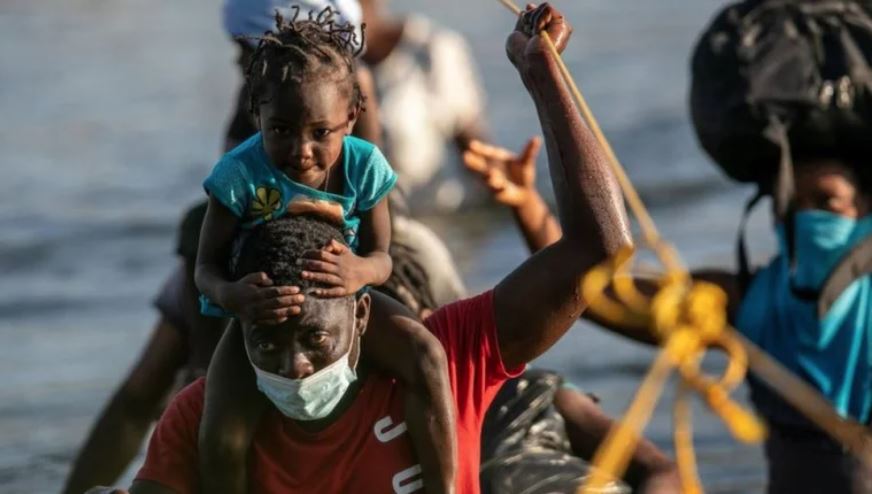 5 claves para entender por qué están llegando miles de haitianos a Estados Unidos (y por qué la mayoría no viene directamente de Haití)