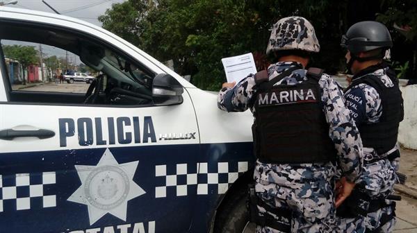 Investigan si cuerpos desmembrados hallados en camionetas en Veracruz son de guatemaltecos
