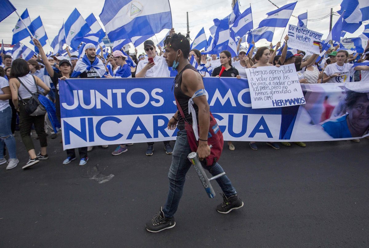 Miles de nicaragüenses salieron a las calles de la capital para exigir la renuncia del presidente Daniel Ortega.(EFE).