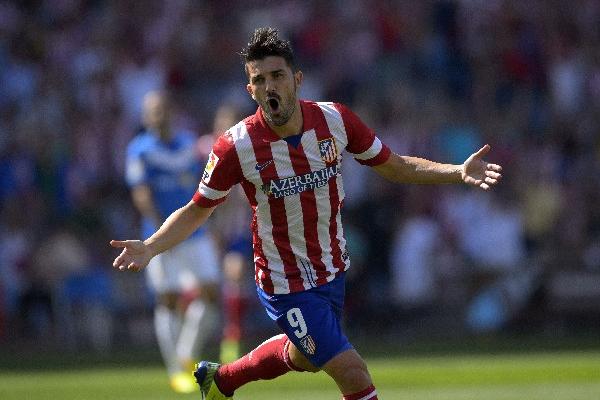 david villa celebra el primer gol del Atlético, de Madrid, en el encuentro contra el Almería, disputado ayer.