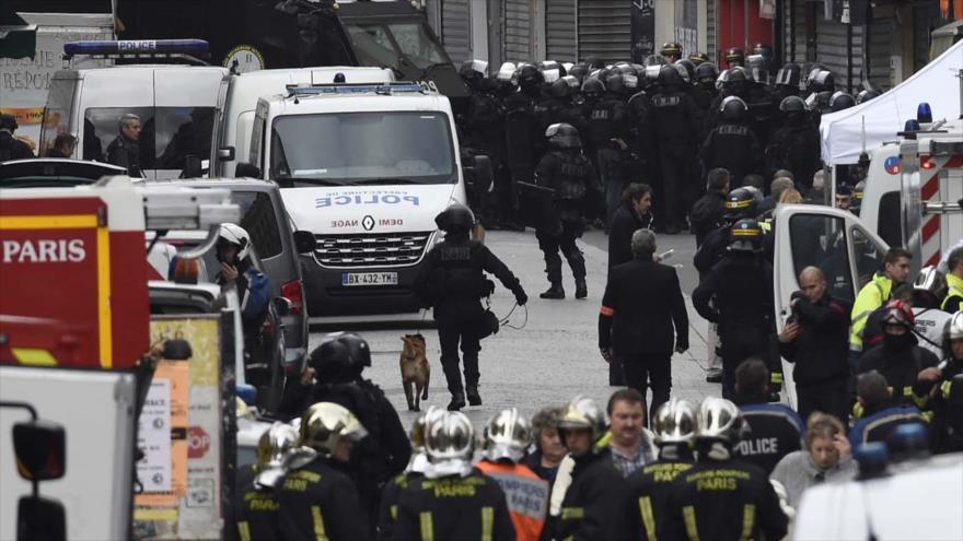 <span class="irc_su" dir="ltr" style="text-align: left;">Operativo de la Policía francesa en Saint Denis, en París.</span> (Foto Prensa Libre: AFP)