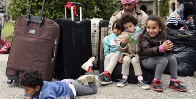 Primeros refugiados sirios llegan a Canadá. (Foto Prensa Libre: AP)