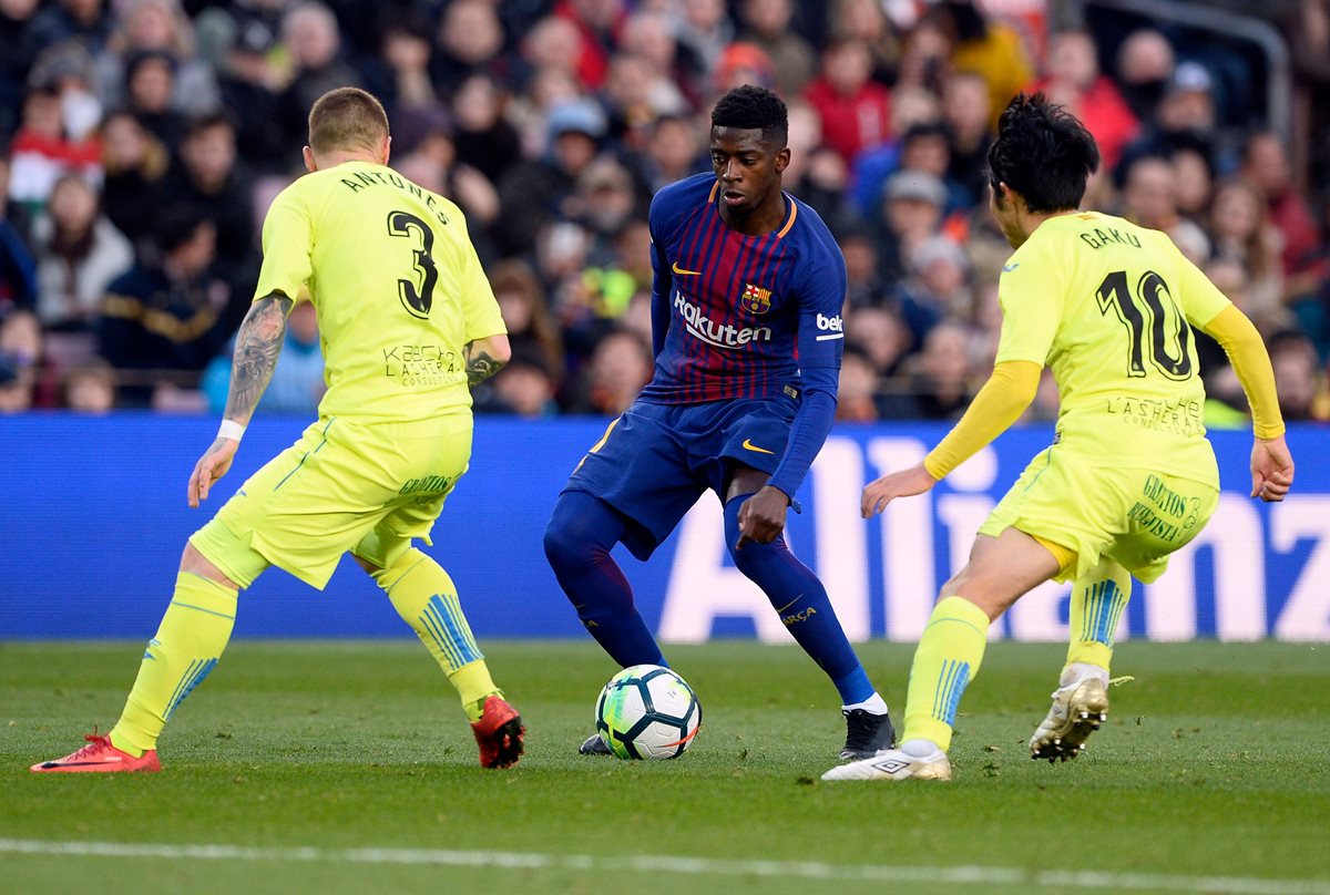 Dembélé fue muy cuidadoso los minutos que estuvo en el campo frente al Getafe. (Foto Prensa Libre: EFE)