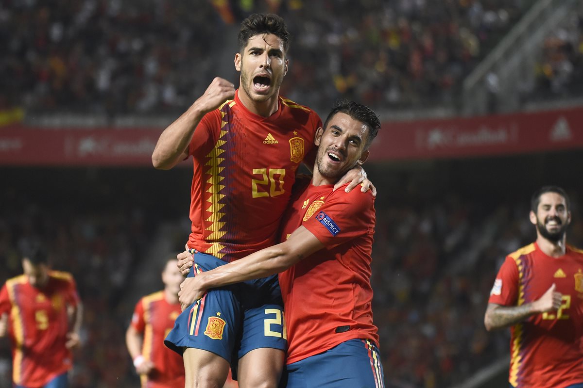 Marco Asensio celebra eufóricamente después de anotarle a la selección croata. (Foto Prensa Libre: AFP)