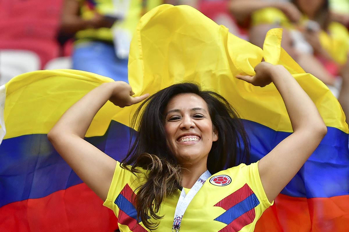 Las aficionadas colombianas celebraron la victoria de su selección contra Polonia.