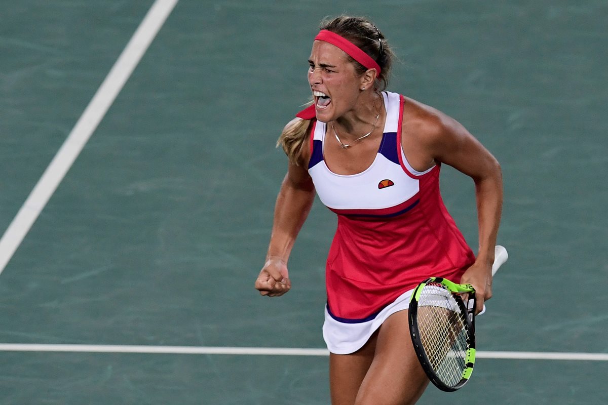 Mónica Puig dejó todo en la cancha para ganar la primera medalla de oro para Puerto Rico. (Foto Prensa Libre: EFE)