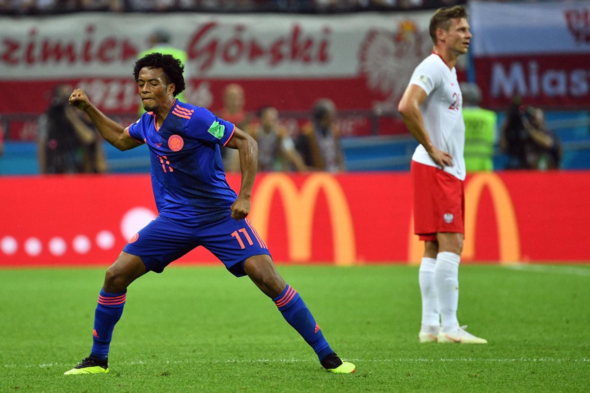 Juan Cuadrado cerró la goleada en un contragolpe que inició James desde el centro de la cancha. (Foto Prensa Libre: AFP)