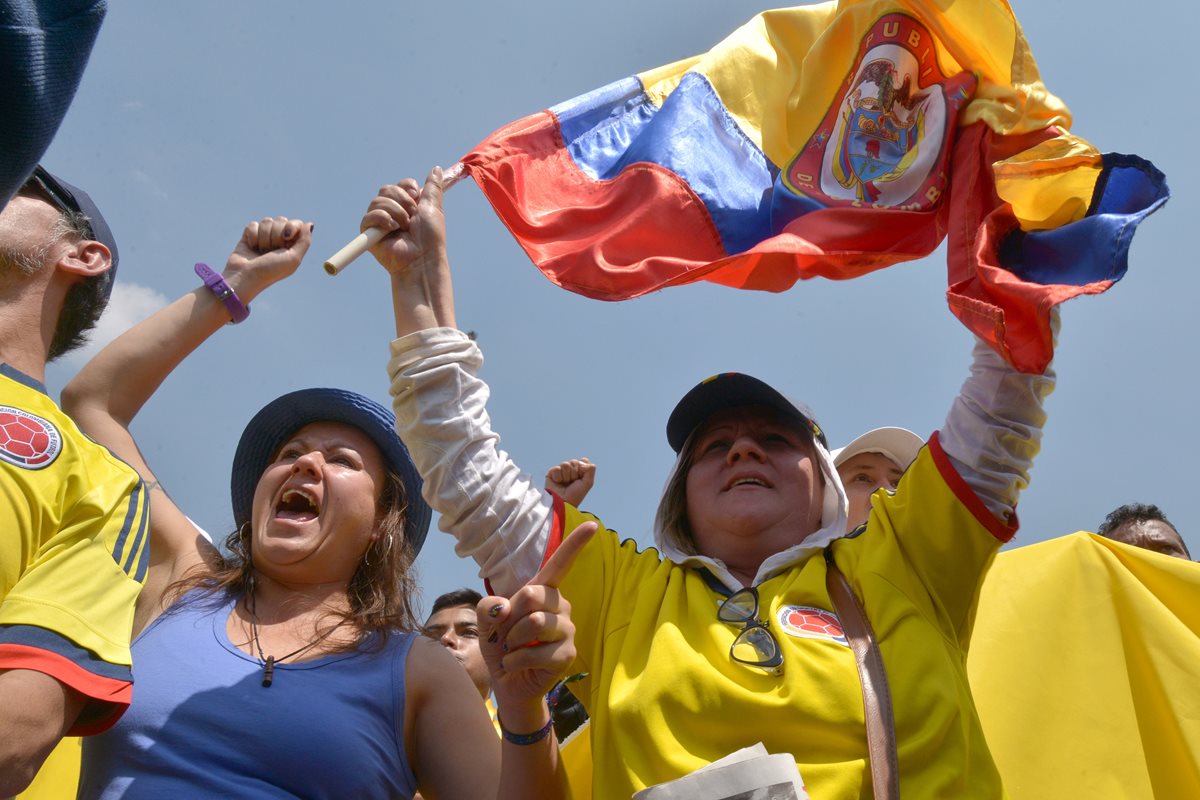 Cientos de colombianos protestan en Bogotá contra políticas económicas de Juan Manuel Santos. (Foto PL: AFP)