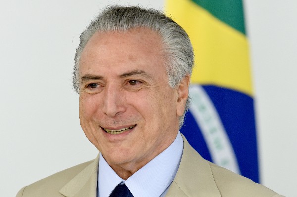 Michel Temer parciticpa en la presentación de los nuevos ministros en Brasilia.(AFP).