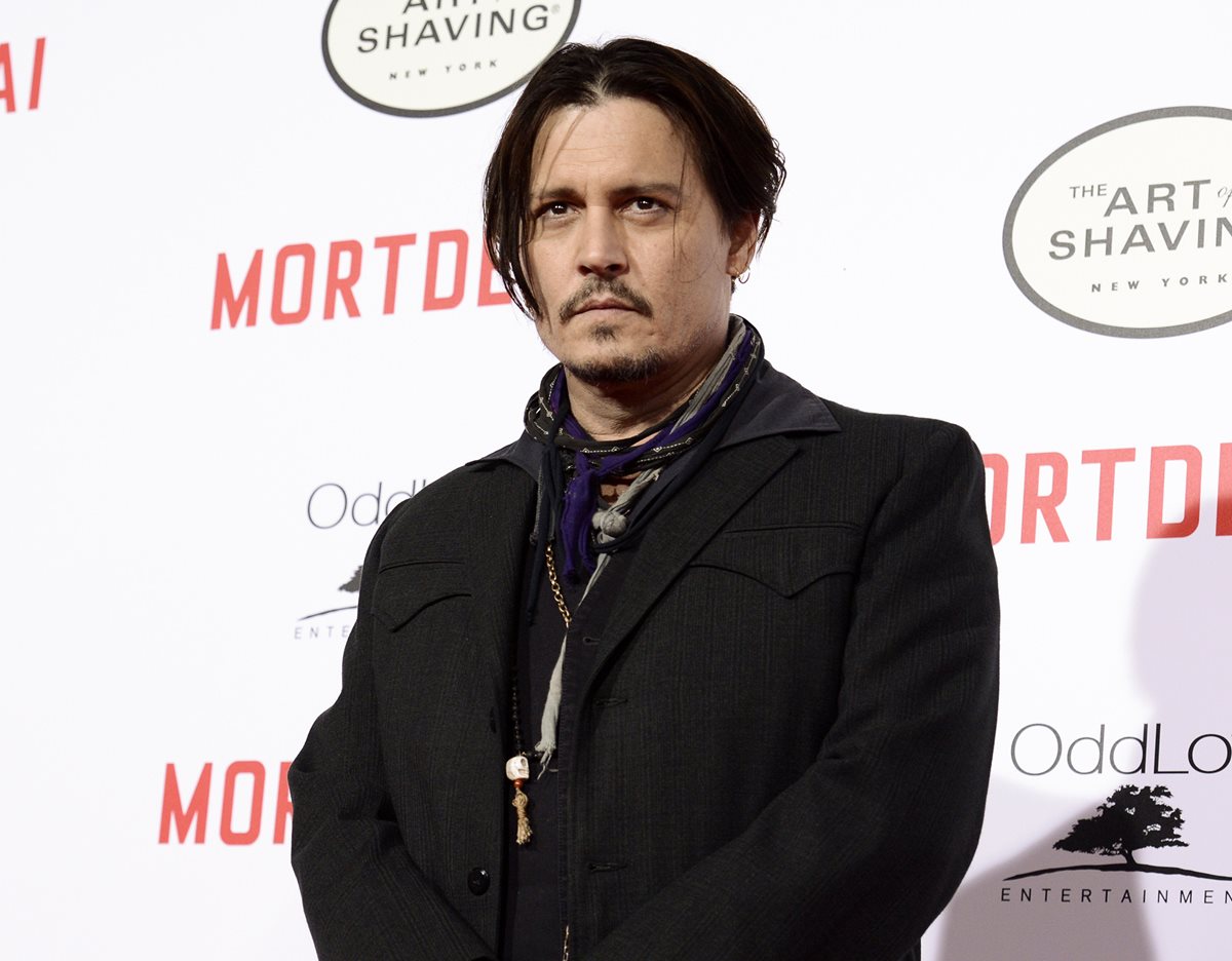 Johnny Depp introdujo dos perros ilegalmente en Australia. (Foto Prensa Libre: AP)