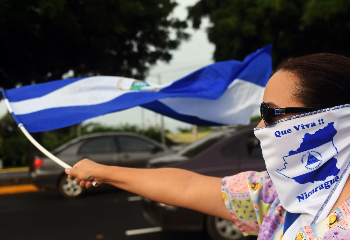 Opositores al gobierno de Ortega participan en una manifestación en Managua, Nicaragua. (AFP).