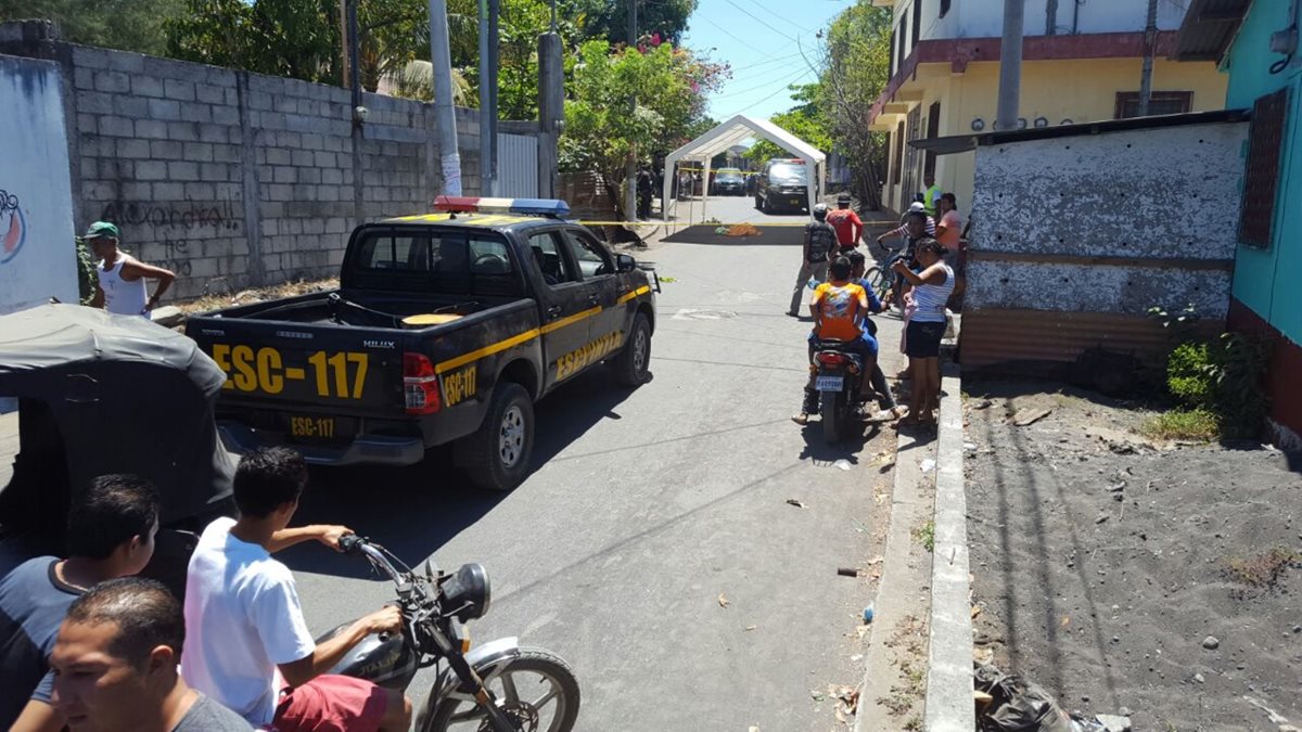 Dos dirigentes fueron atacados a balazos en Puerto San José. (Foto Prensa Libre: Enrique Paredes)