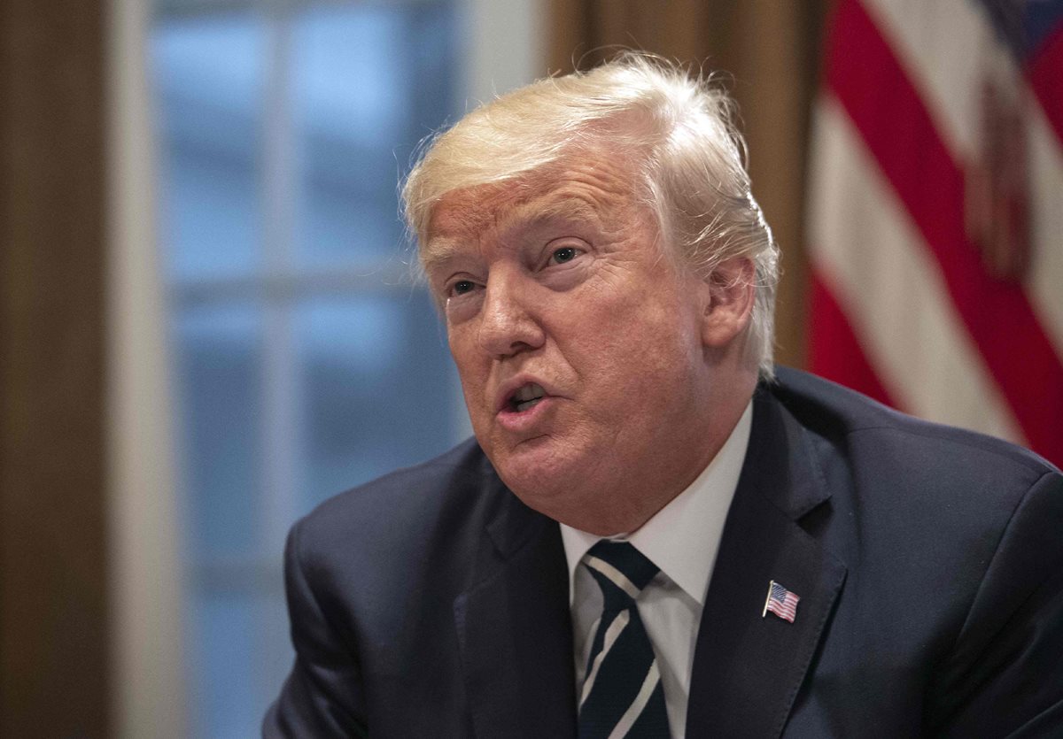 Trump dijo hoy que "se expresó mal" en la cumbre de Helsinki y aclaró que acepta "las conclusiones" de sus agencias de espionaje de que Rusia interfirió en las elecciones de 2016. (Foto Prensa Libre:AFP)