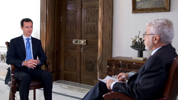 BaChar al-Asad (i)responde a una entrevista por la televisión estatal portuguesa RTP. (Foto Prensa Libre: AFP)