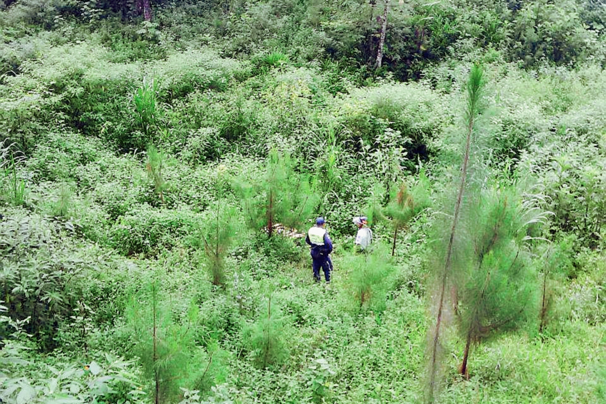 Área donde fue localizado uno de los dos cadáveres, en Cobán, Alta Verapaz. (Foto Prensa Libre: Eduardo Sam)