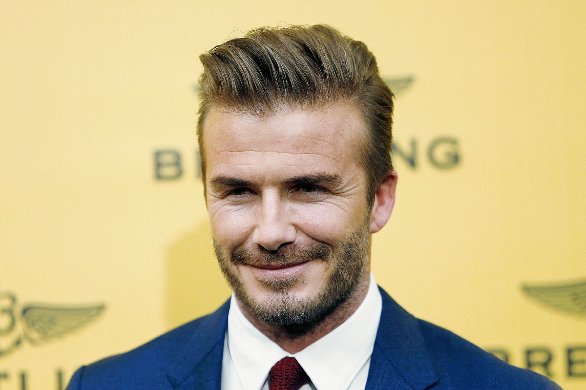 El exfutbolista inglés David Beckham inauguró ayer en Madrid la  Boutique Breitling. (Foto Prensa Libre: EFE)