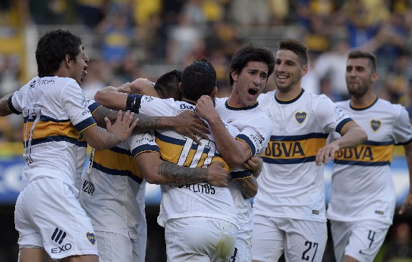 Los jugadores bosteros vivieron una fiesta. (Foto Prensa Libre: AFP)