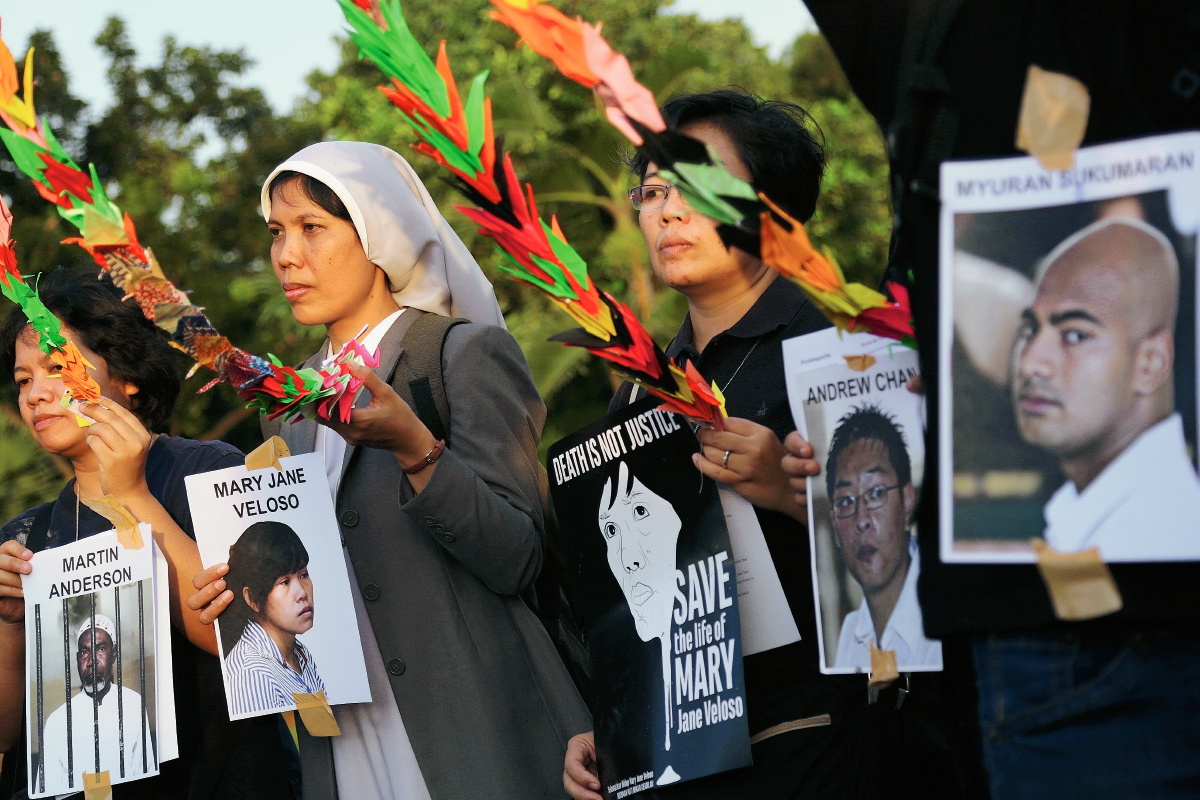 Activistas pedían no ejecutar a reos. (Foto Prensa Libre: AP)