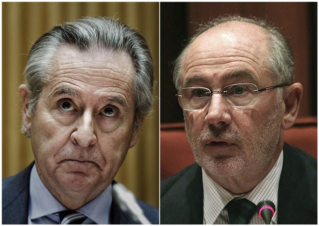 Los expresidentes de Caja Madrid, Miguel Blesa (i) y Rodrigo Rato (d), en una foto de archivo.. La Audiencia Nacional abrirá juicio oral y sentará en el banquillo de los acusados a los expresidentes de Caja Madrid Miguel Blesa y Rodrigo Rato, así como al resto de usuarios de las polémicas tarjetas black. (Foto Prensa Libre: EFE).