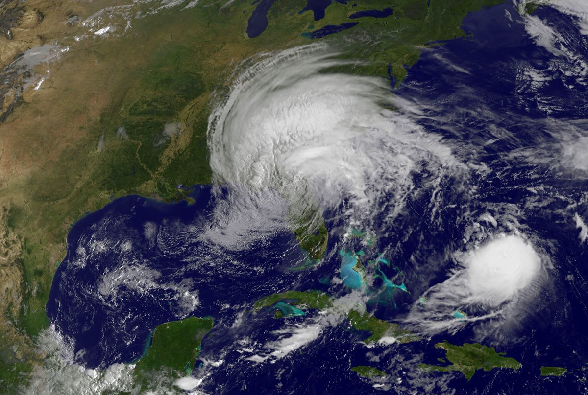 Huracán José -derecha, abajo- tras la tormenta Irma. (Foto Prensa Libre: AFP)