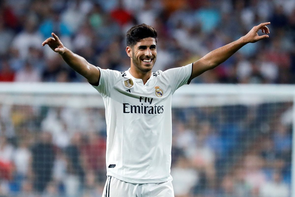 El centrocampista del Real Madrid, Marco Asensio, celebra su gol. (Foto Prensa Libre: EFE)