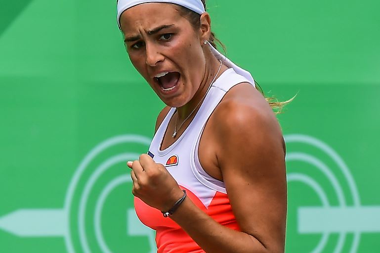 Mónica Puig, de Puerto Rico, festeja después de ganar el partido de la final por el oro en Barranquilla. (Foto Prensa Libre: AFP).