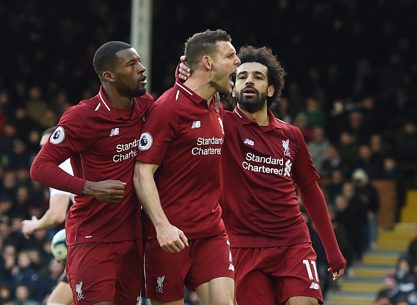 Así festejaron los jugadores del Liverpool contra el Fulham. (Foto Prensa Libre: EFE)