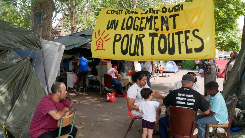 html5-dom-document-internal-entity1-quot-endVivienda para todoshtml5-dom-document-internal-entity1-quot-end, reclama el campamento de protesta de los latinos de Saint-Ouen, un suburbio de París.