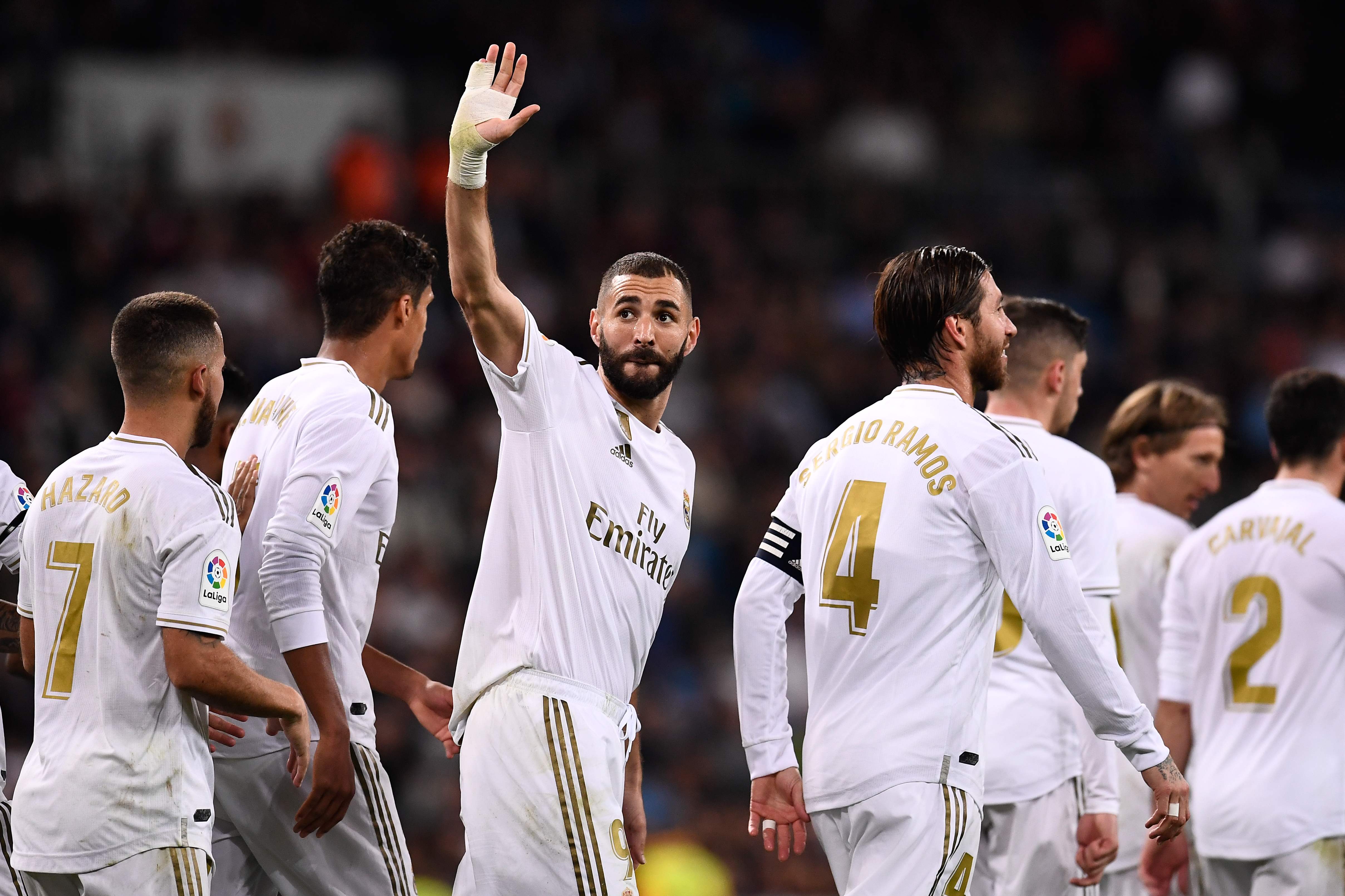 Karim Benzema celebra con sus compañeros, después de anotarle al Leganés. (Foto Prensa Libre: AFP)