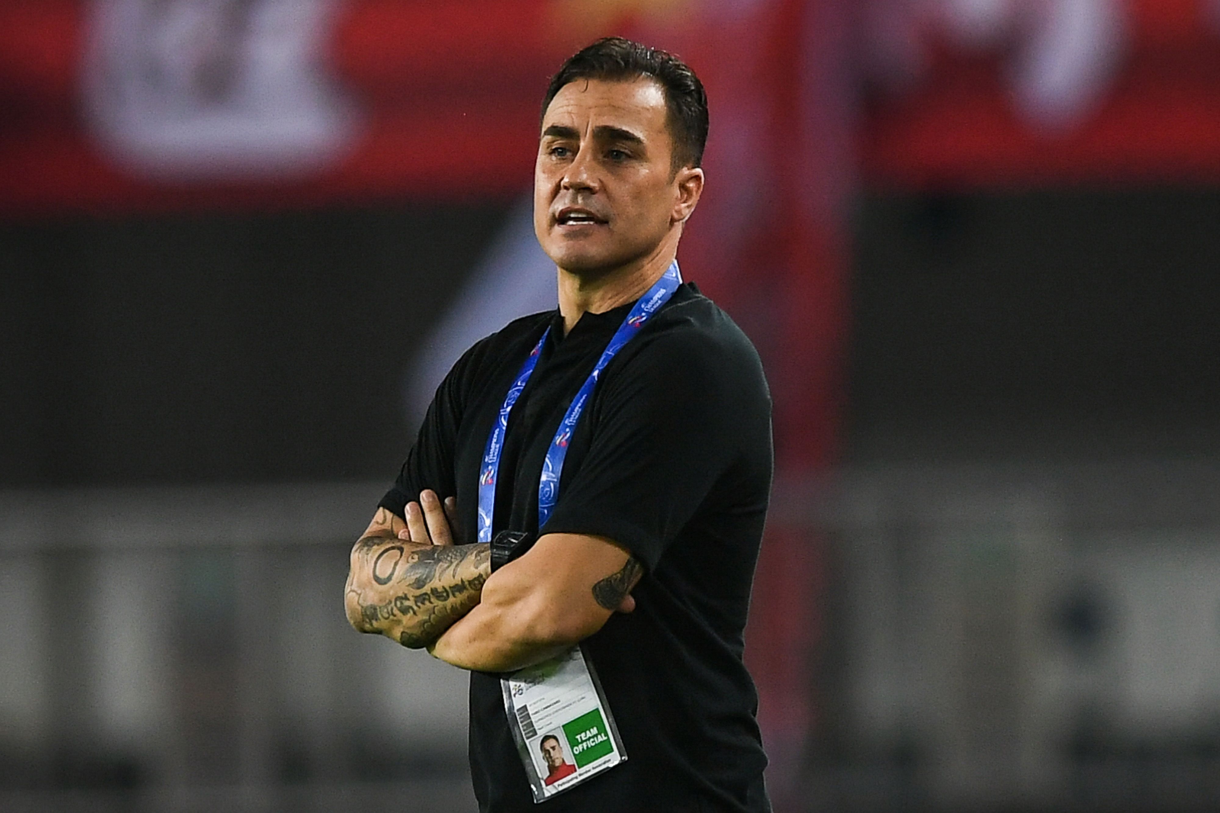 Fabio Cannavaro exseleccionado y campeón con Italia, ahora entrenador de futbol (Photo by STR / AFP) / China OUT / TO GO WITH FBL-ASIA-CHN-ITA-LIPPI-CANNAVARO BY PETER STEBBINGS