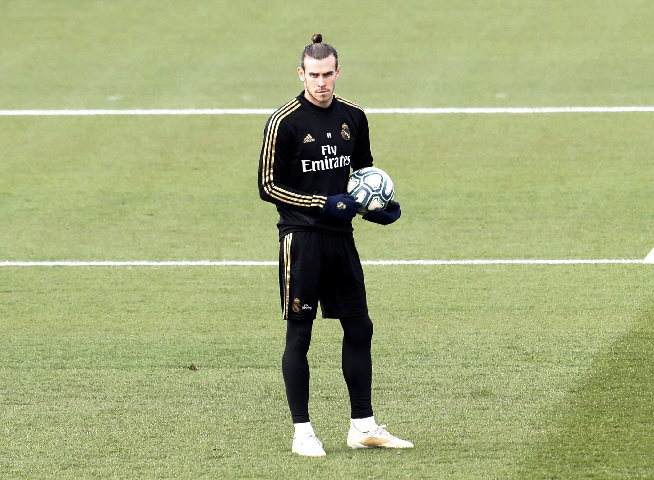 és del Real Madrid Gareth Bale durante el entrenamiento merengue. (Foto Prensa Libre: EFE)