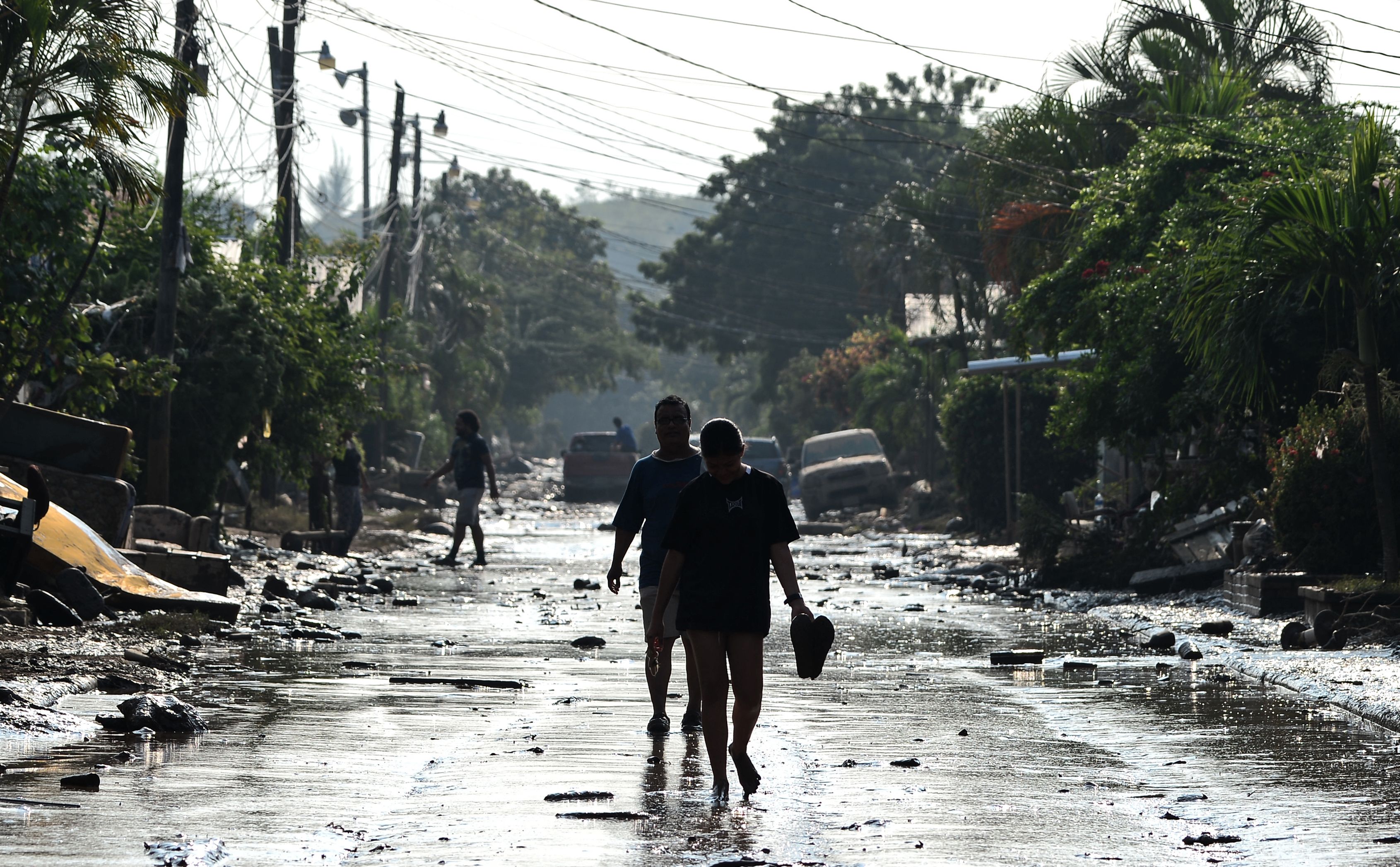 Más de 1.5 millones de niños hondureños están expuestos a los daños por las inundaciones que dejó la depresión tropical Eta a su paso por Honduras. (Foto Prensa Libre: AFP)