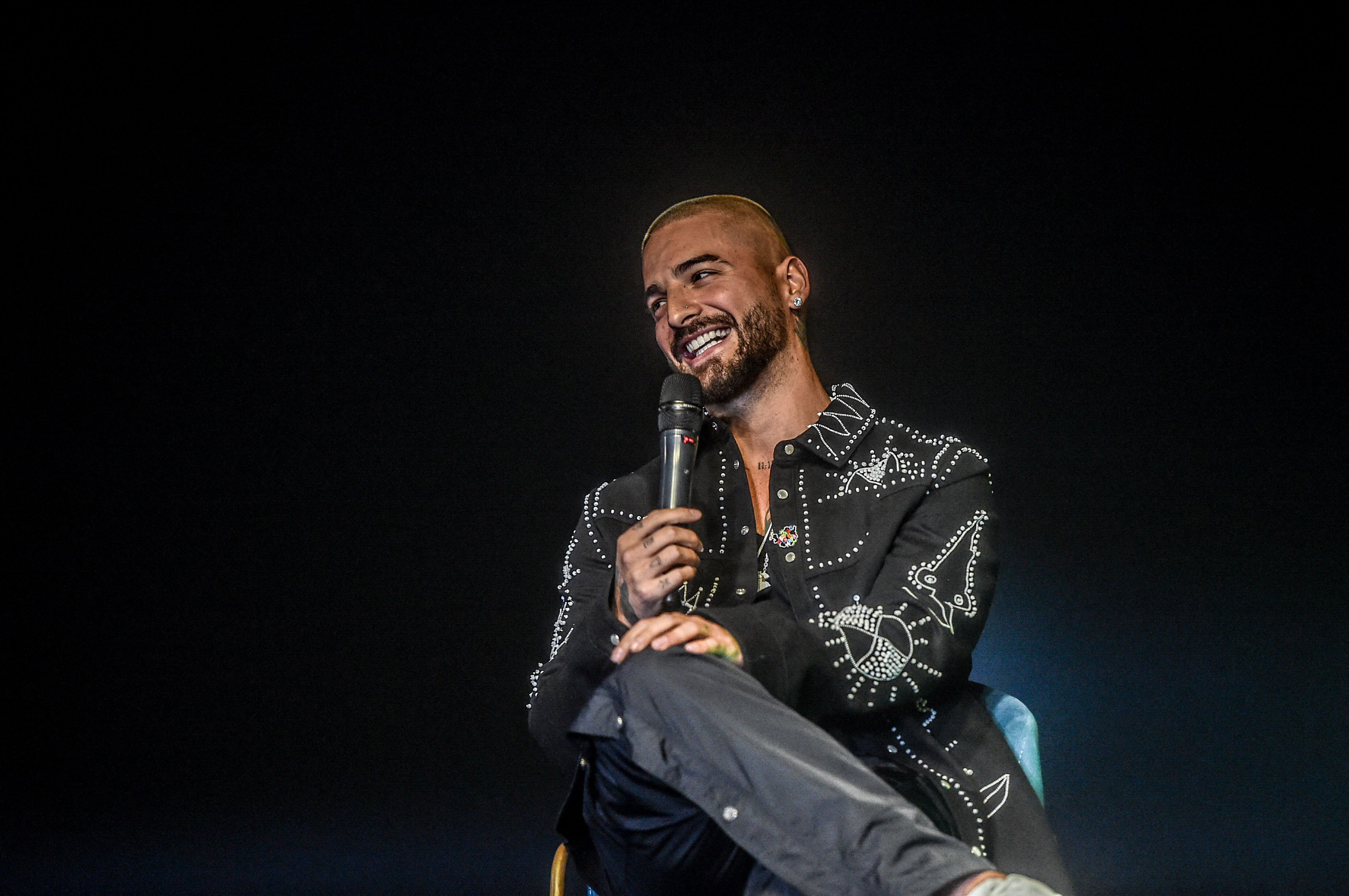 Colombian singer Maluma speaks during a press conference where he announced an upcoming concert in his home city, in Medellin, on November 4, 2021. - The so-called "Papi Juancho Maluma World Tour: Medallo en el Mapa" concert will take place in Medellin on April 30, 2022. (Photo by JOAQUIN SARMIENTO / AFP)