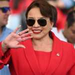 Honduran President Xiomara Castro greets supporters of the ruling Libertad y Refundacion (LIBRE) party during a rally to celebrate the 202nd anniversary of Honduras' independence from the Kingdom of Spain at the Chelato Ucles National Stadium in Tegucigalpa on September 15, 2023. (Photo by Orlando SIERRA / AFP)