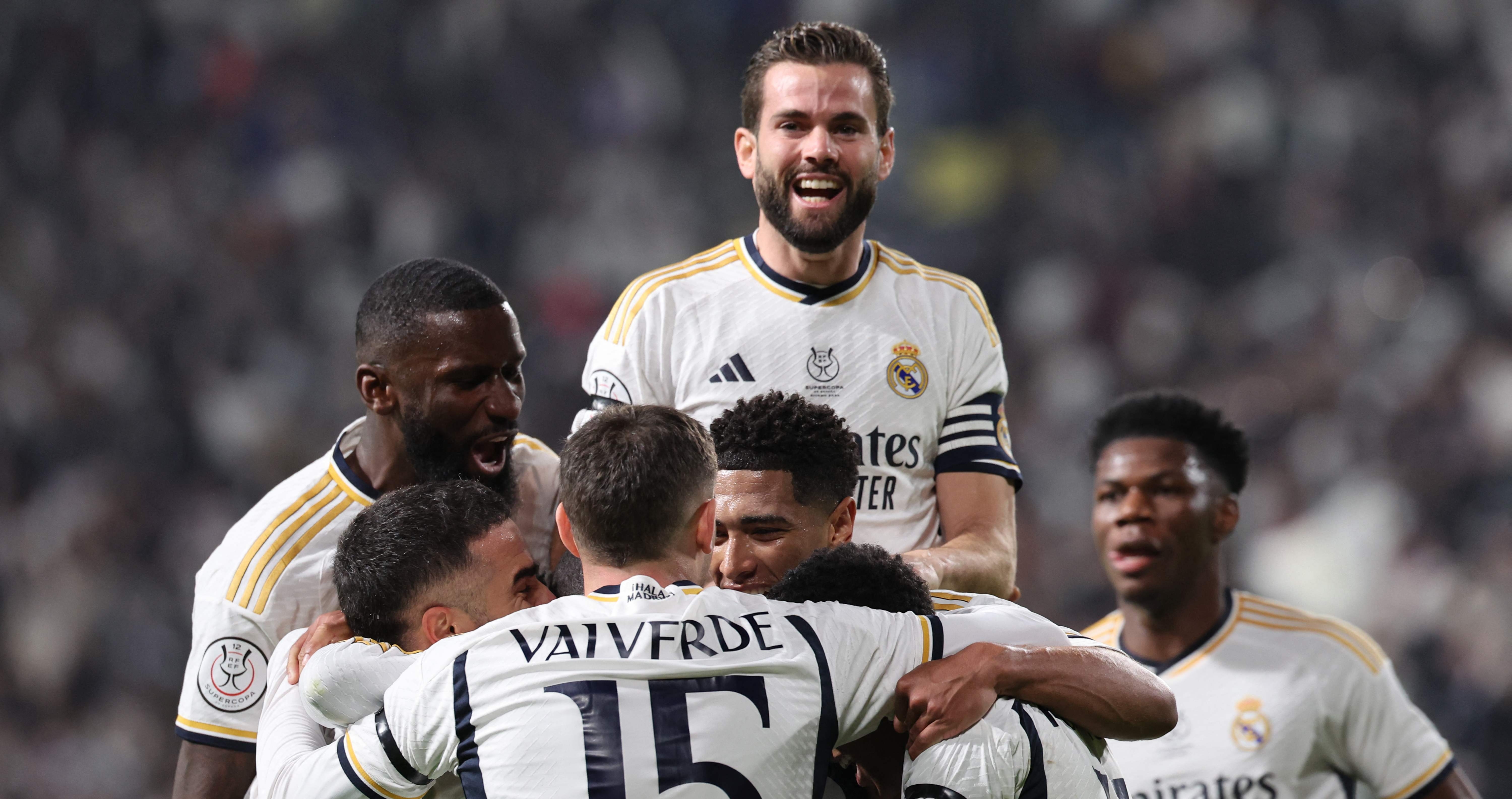 Jugadores del Real Madrid celebran el triunfo ante el Atlético. (Foto Prensa Libre: AFP)