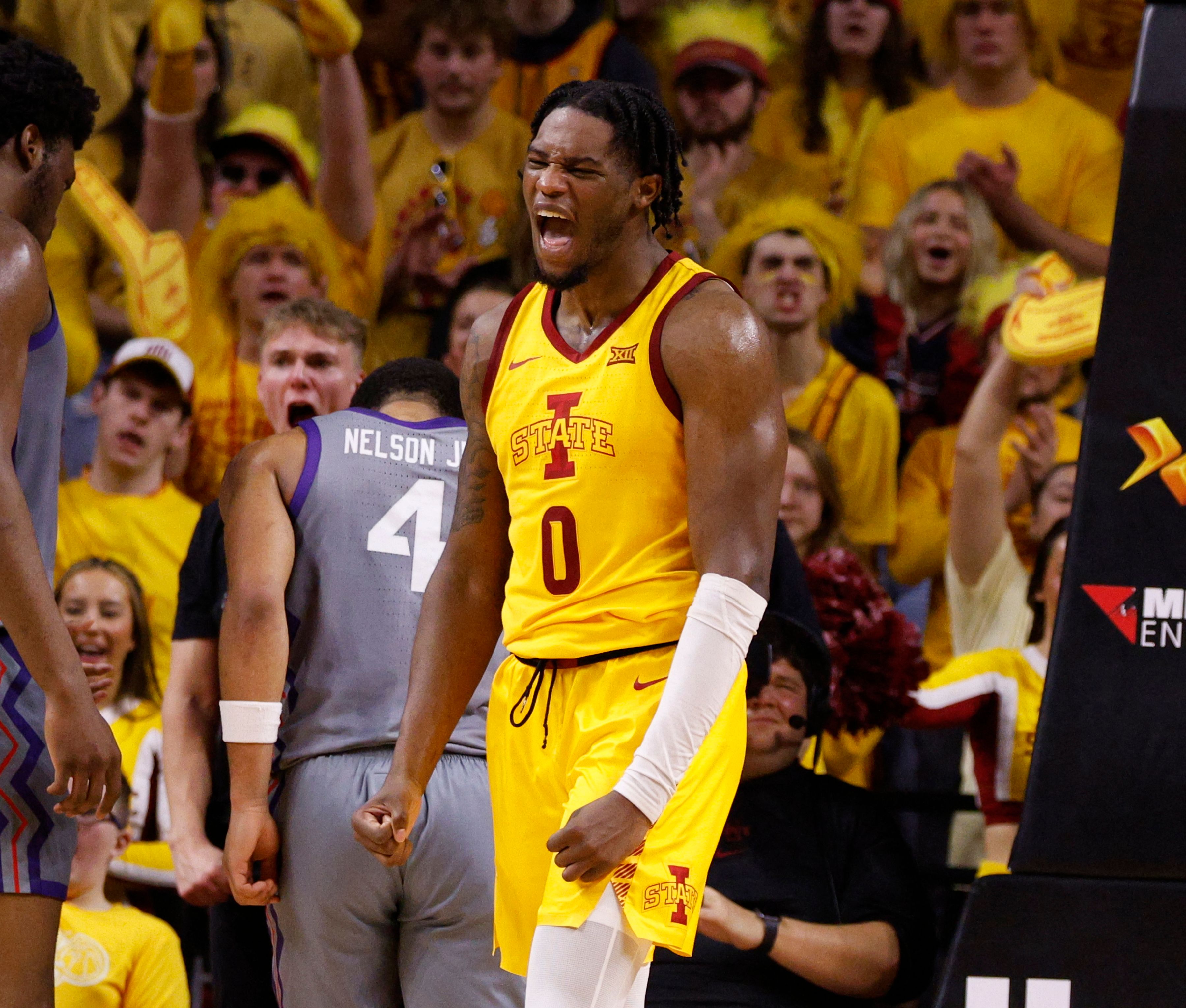 AMES, IA - FEBRUARY 10: Tre King #0 of the Iowa State Cyclones reacts after scoring a basket as Jameer Nelson Jr. #4 of the TCU Horned Frogs watches on in the second half of play at Hilton Coliseum on February 10, 2024 in Ames, Iowa. The Iowa State Cyclones won 71-59 over the TCU Horned Frogs.   David Purdy/Getty Images/AFP (Photo by David Purdy / GETTY IMAGES NORTH AMERICA / Getty Images via AFP)