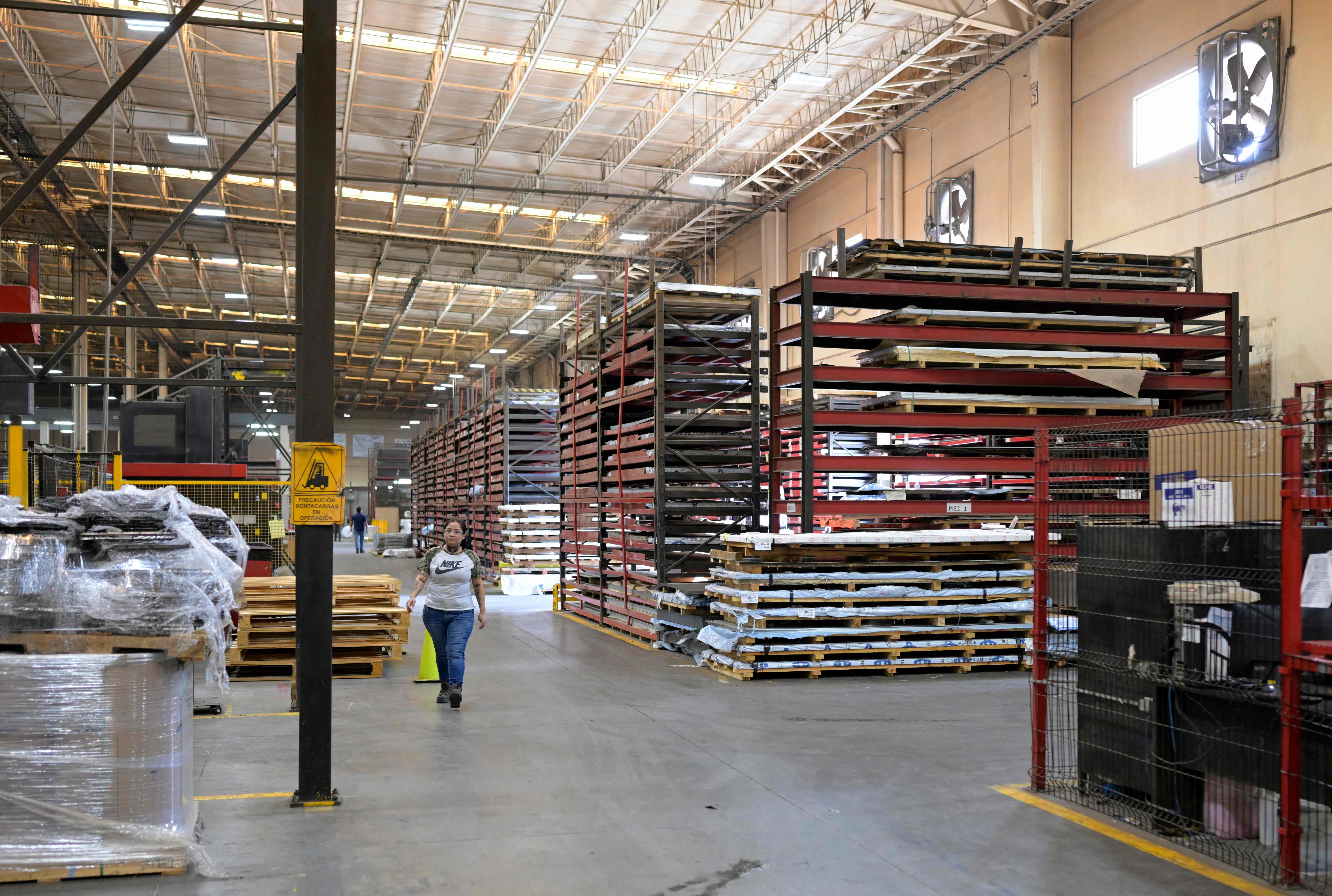 La próxima empresa en ingresar a Guatemala podría encontrarse en el sector de textiles o manufactura. Foto ilustrativa. (Foto Prensa Libre: Alfredo Estrella/AFP) 