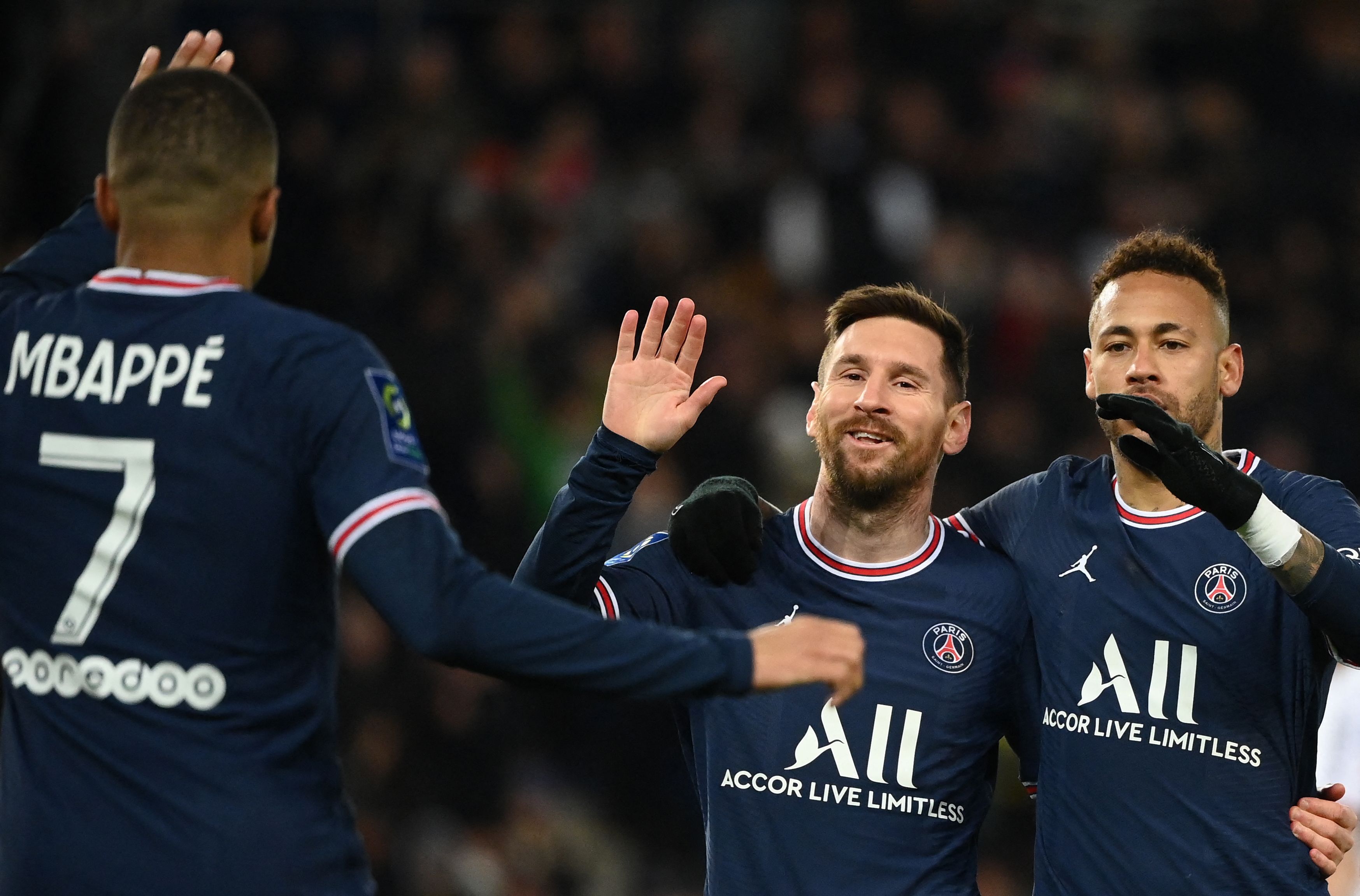 (FILES) Paris Saint-Germain's Argentinian forward Lionel Messi (C) celebrates with Paris Saint-Germain's Brazilian forward Neymar (R) and Paris Saint-Germain's French forward Kylian Mbappe (L) after scoring the 4-1 goal during the French L1 football match between Paris Saint-Germain (PSG) and FC Lorient at the Parc des Princes stadium in Paris on April 3, 2022. Kylian Mbappe confirmed on May 10, 2024, that he will leave French champions Paris Saint-Germain at the end of the season. "I wanted to announce to you all that it's my last year at Paris Saint-Germain. I will not extend and the adventure will come to an end in a few weeks," Mbappe said in a video posted on social media. (Photo by FRANCK FIFE / AFP)