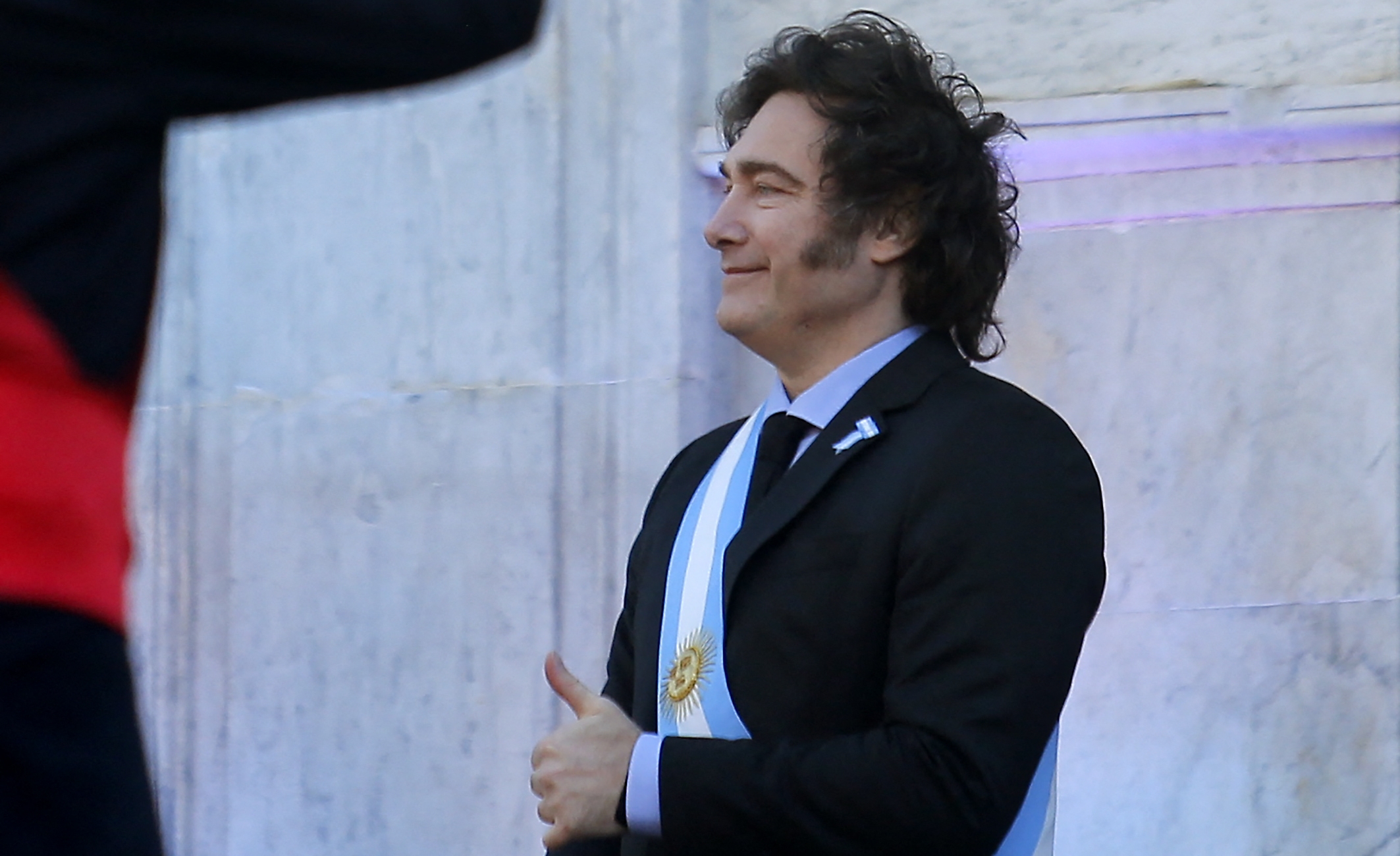 Argentina's President Javier Milei gestures during the commemoration of the 214th anniversary of the May Revolution that led to the independence from Spain, at Plaza San Martin in Cordoba, Argentina, on May 25, 2024. (Photo by Diego LIMA / AFP)